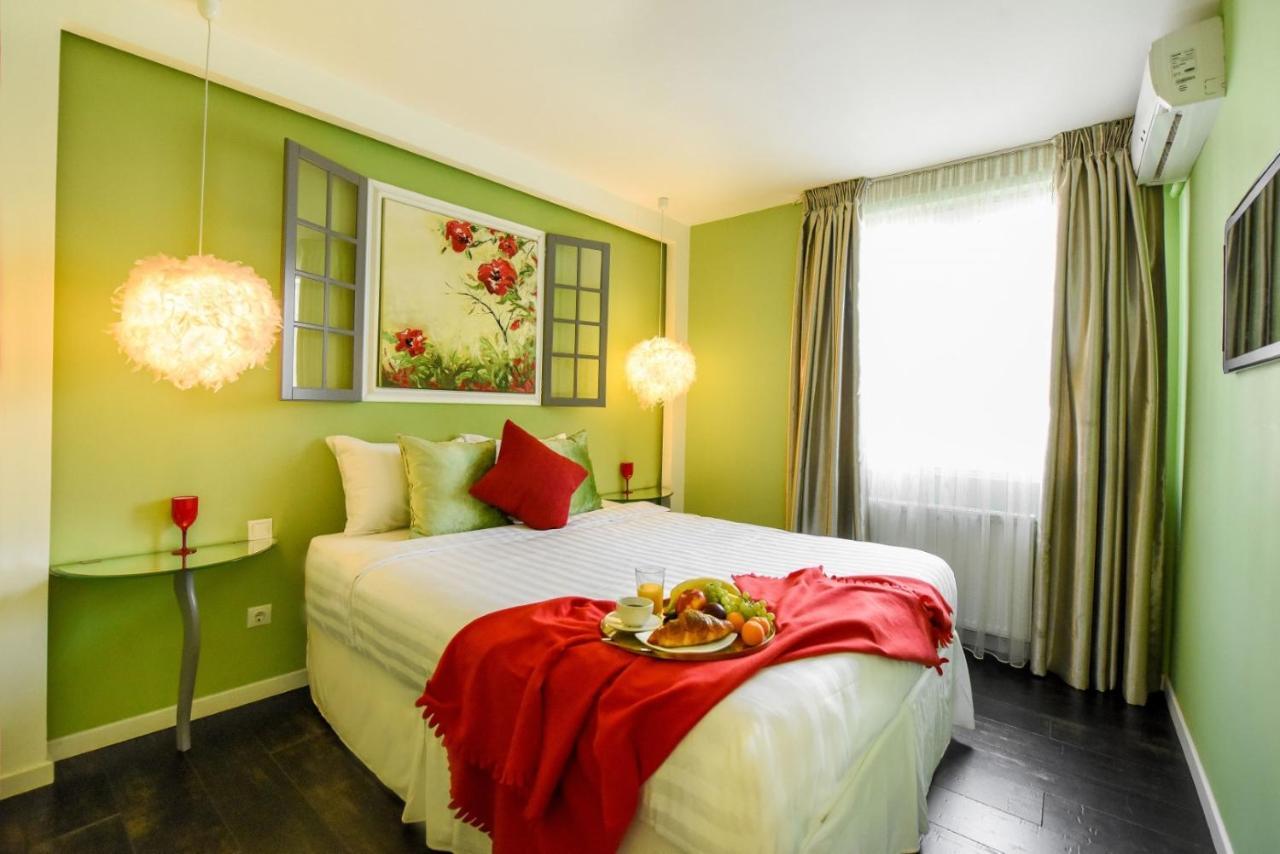 Downtown Oasis: Central Apartments With Cozy Charm Bucarest Extérieur photo
